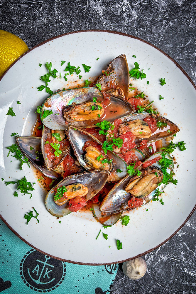 Grünschalmuscheln in fruchtiger Tomatensauce