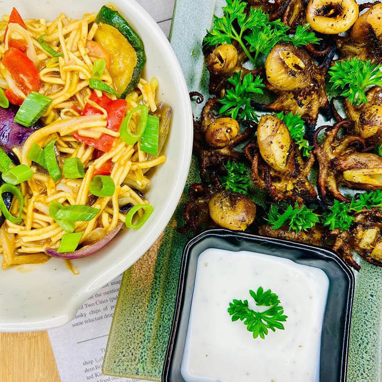 Baby-Oktopus mit Wok Gemüs Baby-Oktopus mit Wok Gemüs